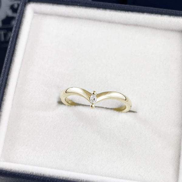 Marquise diamond ring in solid 14k yellow gold.