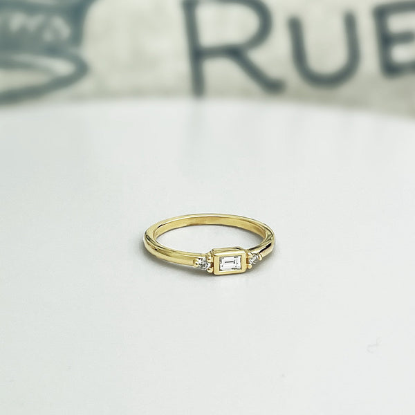 Solid 14k gold baguette diamond ring. Petite and dainty stacking ring.