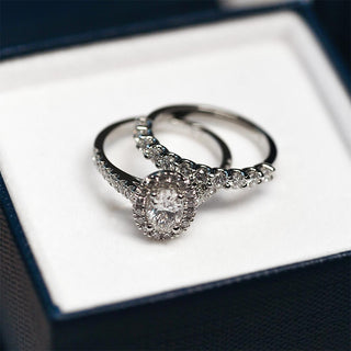 Engagement ring, diamond ring, halo ring, oval diamond, eternity band, bridal set, white gold, wedding ring, custom ring design, design your own ring, u prong eternity band, matching bridal ring set, white gold, gia certified diamonds, handmade, Vancouver jewellery, Gastown goldsmtih