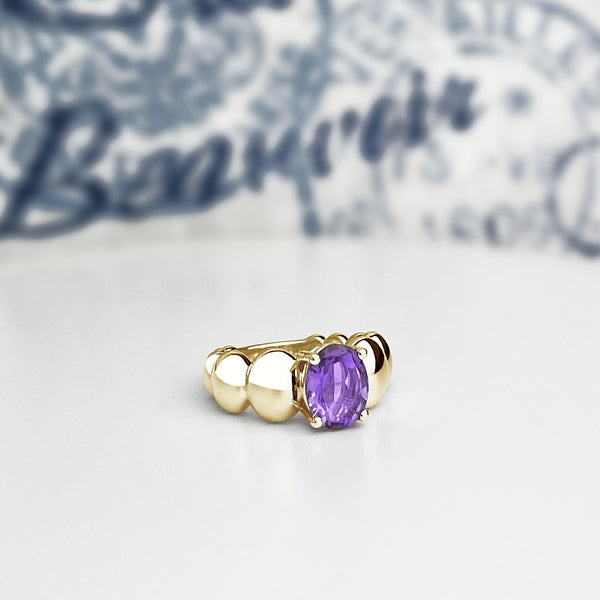 14K yellow gold puff ring with 2.80ct oval amethyst. Customize this ring with your choice of gemstone.