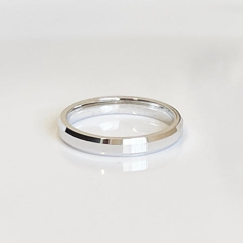 14k, 3mm white gold ring with flat top and flat beveled sides.